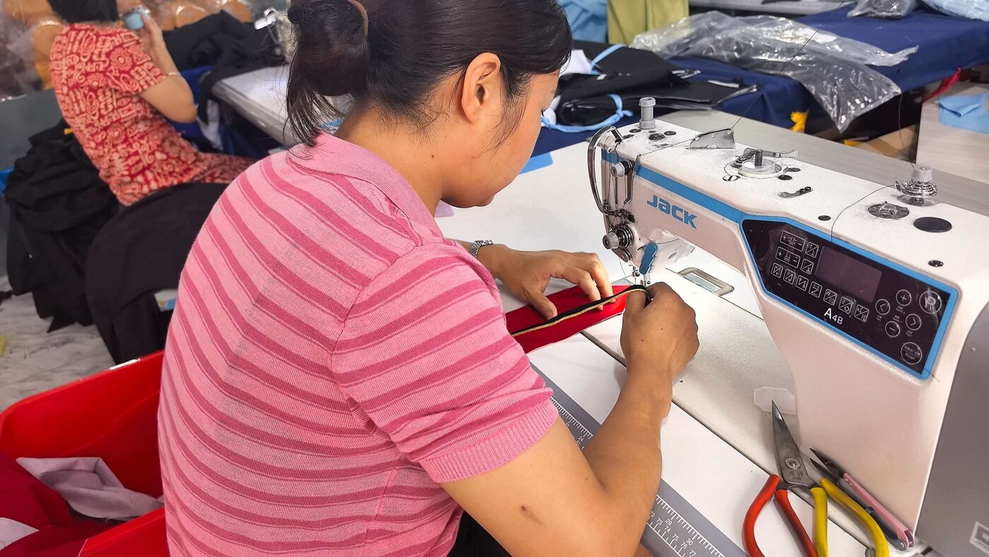 Garment sewing detail in the workshop